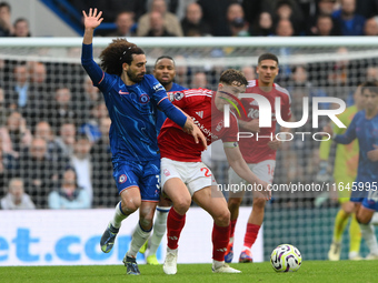 Ryan Yates of Nottingham Forest battles with Marc Cucurella of Chelsea during the Premier League match between Chelsea and Nottingham Forest...