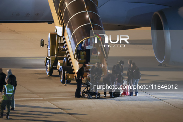 Evacuees land in Eindhoven, Netherlands, on October 4, 2024, from the Middle East. The first repatriation flight from Beirut includes around...