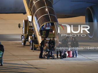 Evacuees land in Eindhoven, Netherlands, on October 4, 2024, from the Middle East. The first repatriation flight from Beirut includes around...