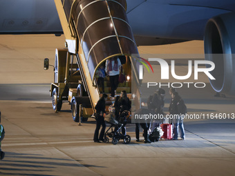 Evacuees land in Eindhoven, Netherlands, on October 4, 2024, from the Middle East. The first repatriation flight from Beirut includes around...