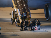 Evacuees land in Eindhoven, Netherlands, on October 4, 2024, from the Middle East. The first repatriation flight from Beirut includes around...