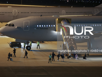 Evacuees land in Eindhoven, Netherlands, on October 4, 2024, from the Middle East. The first repatriation flight from Beirut includes around...