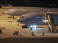 Evacuees land in Eindhoven, Netherlands, on October 4, 2024, from the Middle East. The first repatriation flight from Beirut includes around...