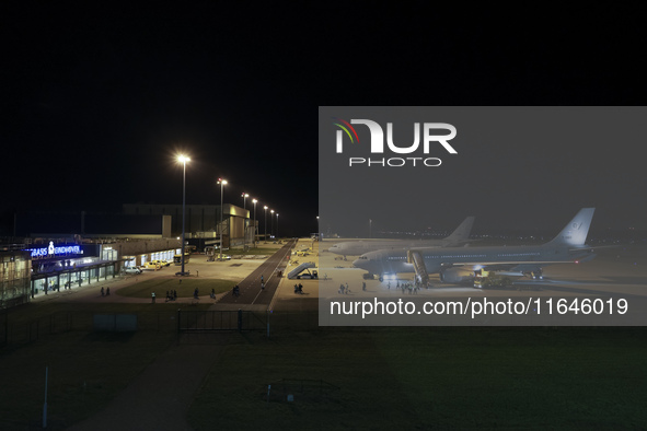 Evacuees land in Eindhoven, Netherlands, on October 4, 2024, from the Middle East. The first repatriation flight from Beirut includes around...