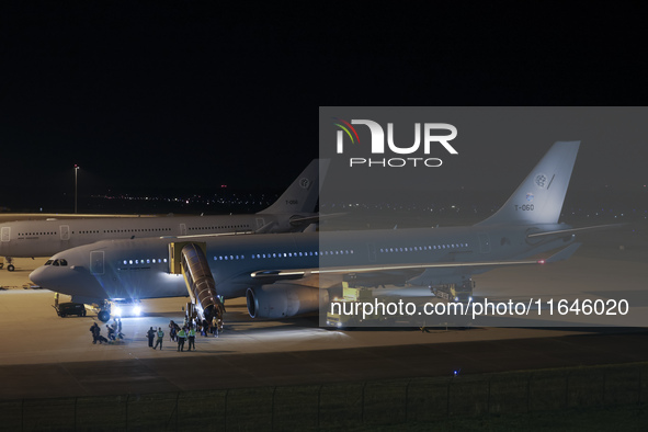 Evacuees land in Eindhoven, Netherlands, on October 4, 2024, from the Middle East. The first repatriation flight from Beirut includes around...