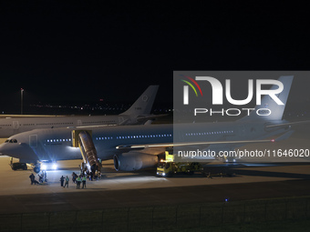 Evacuees land in Eindhoven, Netherlands, on October 4, 2024, from the Middle East. The first repatriation flight from Beirut includes around...