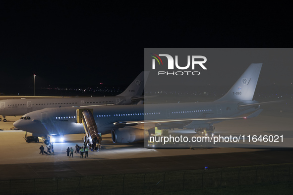 Evacuees land in Eindhoven, Netherlands, on October 4, 2024, from the Middle East. The first repatriation flight from Beirut includes around...