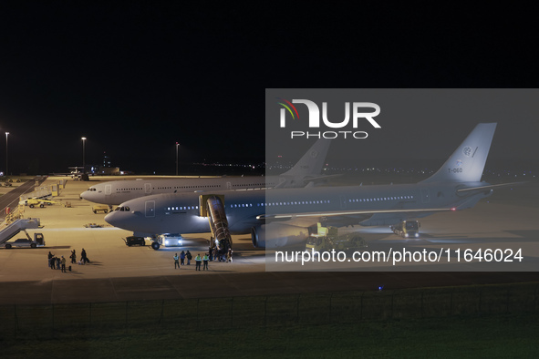 Evacuees land in Eindhoven, Netherlands, on October 4, 2024, from the Middle East. The first repatriation flight from Beirut includes around...