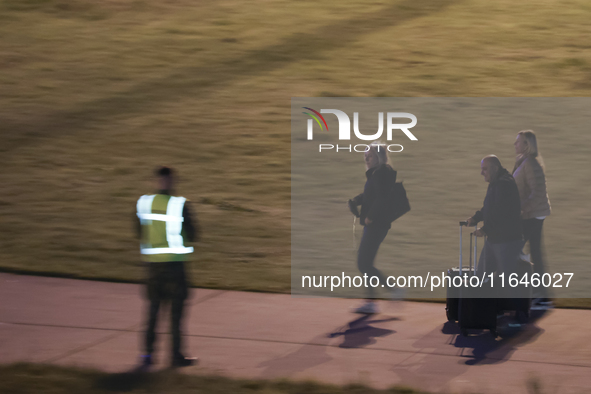 Evacuees land in Eindhoven, Netherlands, on October 4, 2024, from the Middle East. The first repatriation flight from Beirut includes around...