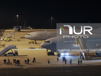 Evacuees land in Eindhoven, Netherlands, on October 4, 2024, from the Middle East. The first repatriation flight from Beirut includes around...