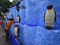 Workers make a pandal for the Durga Puja festival in Nagaon District, Assam, India, on October 7, 2024. (