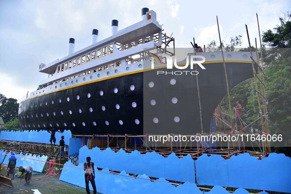 A 'pandal' is made in the shape of the ship 'Titanic' for the Durga Puja festival in Nagaon district, Assam, India, on October 7, 2024. 