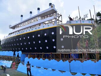 A 'pandal' is made in the shape of the ship 'Titanic' for the Durga Puja festival in Nagaon district, Assam, India, on October 7, 2024. (