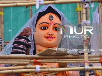 Artists make 51-foot idols of Goddess Durga for the upcoming Durga Puja festival at a pandal in Nagaon District, Assam, India, on October 7,...