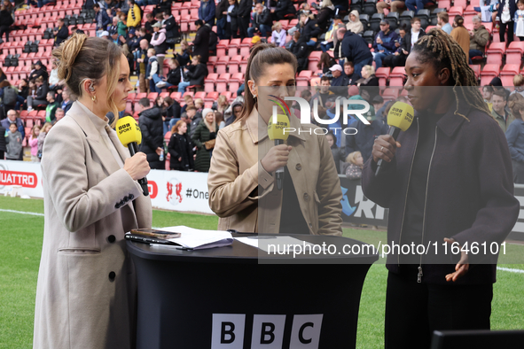 In London, England, on October 6, 2024, BBC Sport pundits Kelly Somers, Fara Williams, and Anita Asanta are present during the Barclays FA W...