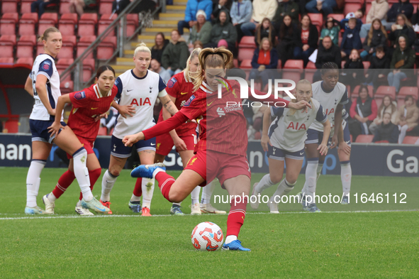 Marie Hobinger of Liverpool Women scores from the penalty spot during the Barclays FA Women's Super League soccer match between Tottenham Ho...