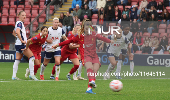 Marie Hobinger of Liverpool Women scores from the penalty spot during the Barclays FA Women's Super League soccer match between Tottenham Ho...