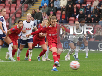 Marie Hobinger of Liverpool Women scores from the penalty spot during the Barclays FA Women's Super League soccer match between Tottenham Ho...