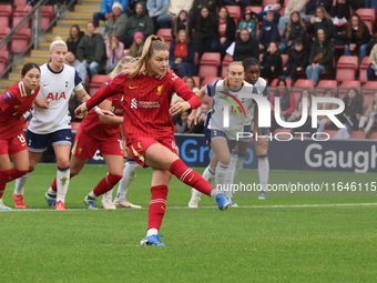 Marie Hobinger of Liverpool Women scores from the penalty spot during the Barclays FA Women's Super League soccer match between Tottenham Ho...