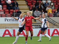 Molly Bartrip of Tottenham Hotspur Women and Sophie Roman Haug of Liverpool Women are in action during the Barclays FA Women's Super League...