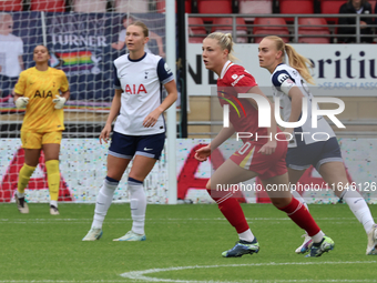 Molly Bartrip of Tottenham Hotspur Women and Sophie Roman Haug of Liverpool Women are in action during the Barclays FA Women's Super League...