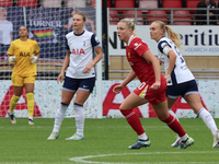 Molly Bartrip of Tottenham Hotspur Women and Sophie Roman Haug of Liverpool Women are in action during the Barclays FA Women's Super League...