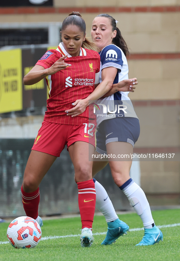 Taylor Hinds of Liverpool Women and Hayley Raso of Tottenham Hotspur Women are in action during the Barclays FA Women's Super League soccer...