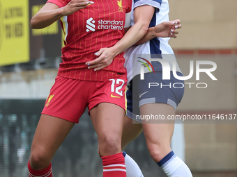 Taylor Hinds of Liverpool Women and Hayley Raso of Tottenham Hotspur Women are in action during the Barclays FA Women's Super League soccer...