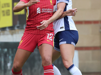 Taylor Hinds of Liverpool Women and Hayley Raso of Tottenham Hotspur Women are in action during the Barclays FA Women's Super League soccer...