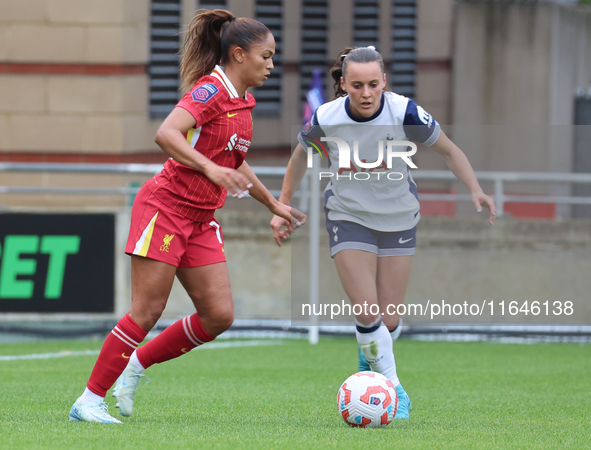 Taylor Hinds of Liverpool Women and Hayley Raso of Tottenham Hotspur Women play during the Barclays FA Women's Super League soccer match bet...