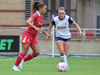 Taylor Hinds of Liverpool Women and Hayley Raso of Tottenham Hotspur Women play during the Barclays FA Women's Super League soccer match bet...