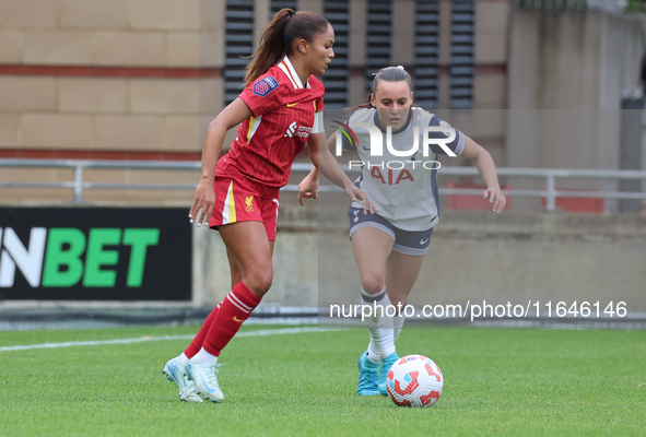 Taylor Hinds of Liverpool Women and Hayley Raso of Tottenham Hotspur Women play during the Barclays FA Women's Super League soccer match bet...