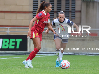 Taylor Hinds of Liverpool Women and Hayley Raso of Tottenham Hotspur Women play during the Barclays FA Women's Super League soccer match bet...