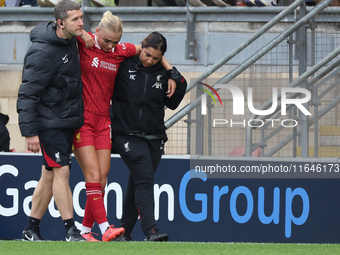 Sofie Lundgaard of Liverpool Women sustains an injury during the Barclays FA Women's Super League soccer match between Tottenham Hotspur Wom...