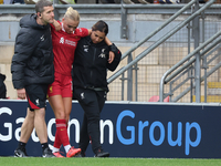 Sofie Lundgaard of Liverpool Women sustains an injury during the Barclays FA Women's Super League soccer match between Tottenham Hotspur Wom...