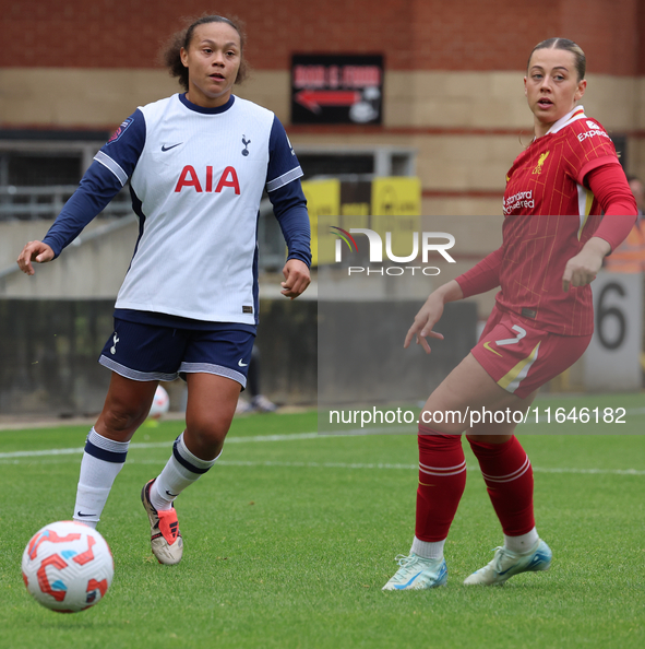 Drew Spence of Tottenham Hotspur Women and Cornelia Kapocs of Liverpool Women are in action during the Barclays FA Women's Super League socc...