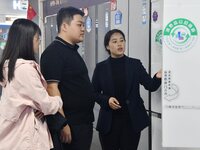 Consumers shop for refrigerators at a trade-in promotion for home appliances in Handan, China, on October 7, 2024. (