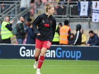 Yana Daniels of Liverpool Women participates in the pre-match warm-up during the Barclays FA Women's Super League soccer match between Totte...