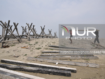 Porcupine pillars are used to reduce erosion along the river Brahmaputra in Guwahati, India, on April 6, 2018. The Brahmaputra is one of Asi...