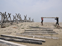 Porcupine pillars are used to reduce erosion along the river Brahmaputra in Guwahati, India, on April 6, 2018. The Brahmaputra is one of Asi...