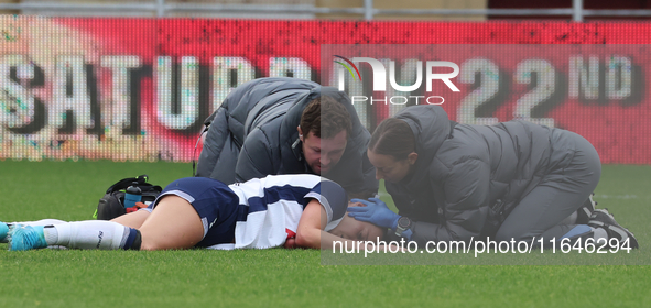 Hayley Raso of Tottenham Hotspur Women picks up a knock during the Barclays FA Women's Super League soccer match between Tottenham Hotspur W...