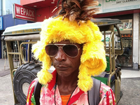 Tribal community people who work in the tea garden collect donations for the upcoming 'Dashai Puja,' which is celebrated during the Dusshera...