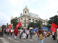 The Communist Party of India (Marxist), West Bengal, holds posters during a protest amid the ongoing conflict in Gaza between Israel and Ham...