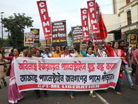 The Communist Party of India (Marxist), West Bengal, holds posters and shouts slogans during a protest amid the ongoing conflict in Gaza bet...