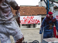 A banner in support of the Palestinian people is seen on a wall in the Liogenteng settlement area in Bandung, West Java, Indonesia, on Octob...