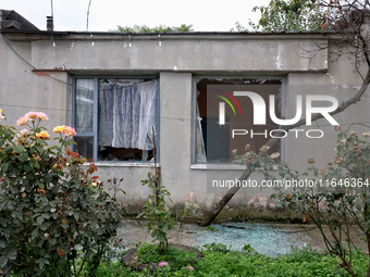 Broken windows of the building are seen as a result of a Russian drone attack in Odesa, Ukraine, on October 6, 2024. (