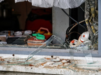 Broken windows of the building are seen as a result of a Russian drone attack in Odesa, Ukraine, on October 6, 2024. (