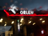 Orlen logo is seen through the raindrops on the car window at a gas station Poland on October 6, 2024. (