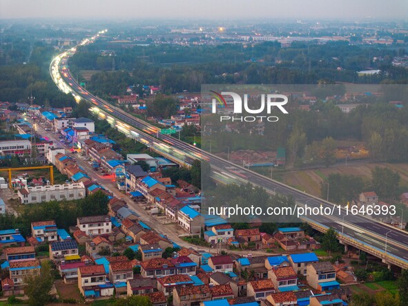 A large number of vehicles return on a highway in Huai'an, China, on October 7, 2024. 