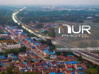 A large number of vehicles return on a highway in Huai'an, China, on October 7, 2024. (